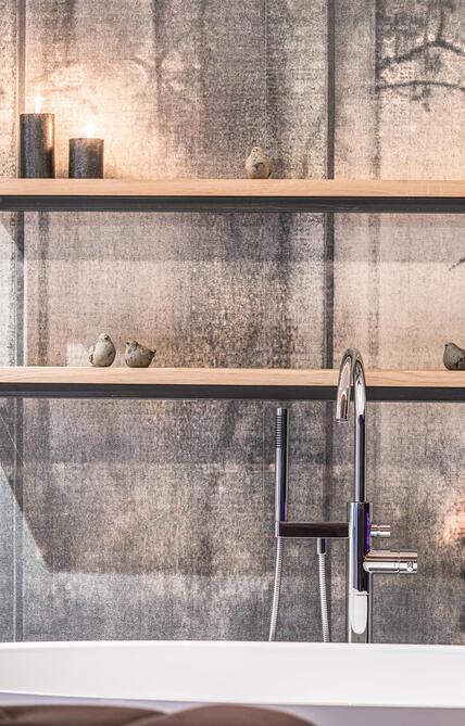 A freestanding bathtub in the spa area
