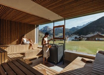 A man and a woman enjoy a shared sauna session in the Panorama Event Sauna