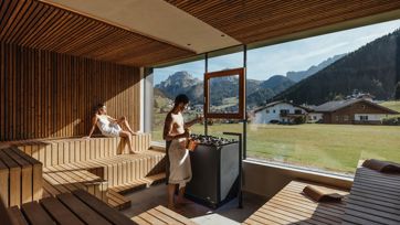 A man and a woman enjoy a shared sauna session in the Panorama Event Sauna