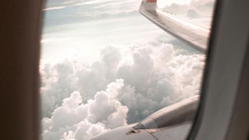 View on the clouds from the window of an airplane